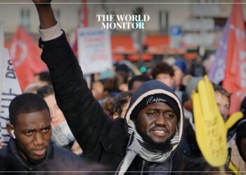 Protests Erupt in Paris Against Immigration Law