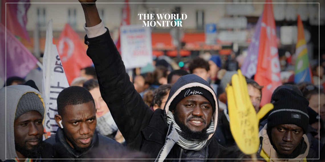 Protests Erupt in Paris Against Immigration Law