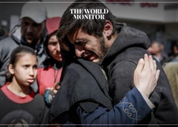 People mourn after dozens died while trying to get food at an aid distribution point in Gaza City on February 29, 2024. (Photo by AFP)
